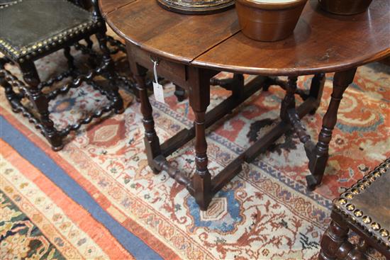 An early 18th century yew wood gateleg table, W.3ft 1in. D.3ft 5in. H.2ft 4in.